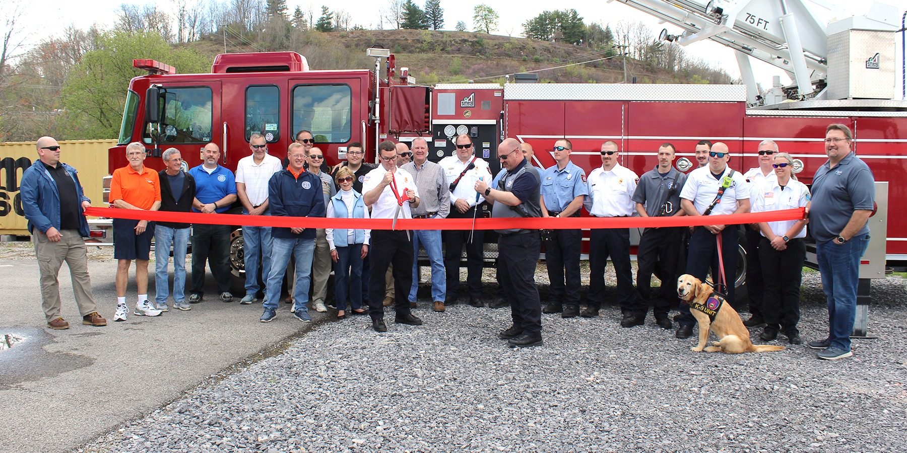 The Princeton Fire Department and city officials at a ribbon cutting ceremony for a new firetruck for the department.